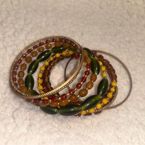Elegant Beaded Bracelet Set with Green, Yellow, and Brown Accents